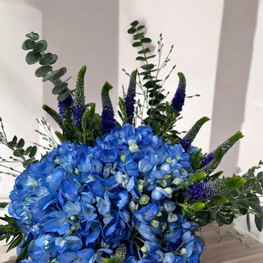 Blue Hydrangea & Veronica Arrangement with Lemon Accents